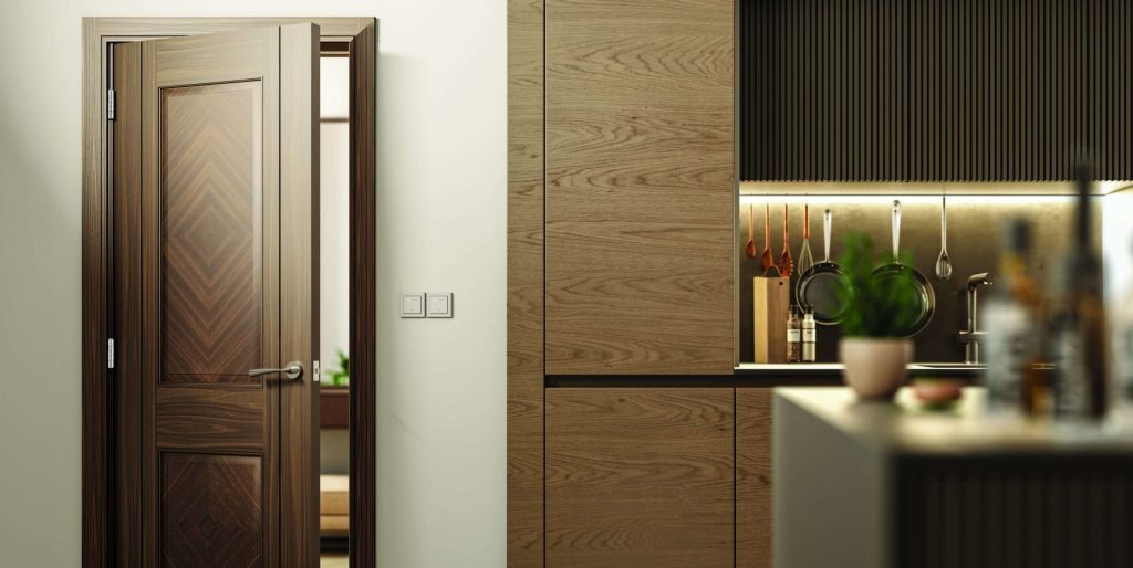 Deanta Sandringham Internal Door Black in contemporary kitchen setting, promoting the new Doorset Brochure.